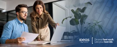 Photo of two office workers along with IDeaS logo and tagline - Do your best work. Live your best life.